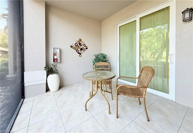Hard-to-find FIRST-FLOOR 2BR + DEN / 2BA Veranda with garage in on Naples Heritage Golf and Country Club in Florida - for sale on GolfHomes.com, golf home, golf lot
