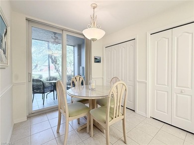 Hard-to-find FIRST-FLOOR 2BR + DEN / 2BA Veranda with garage in on Naples Heritage Golf and Country Club in Florida - for sale on GolfHomes.com, golf home, golf lot