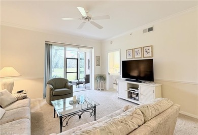 Hard-to-find FIRST-FLOOR 2BR + DEN / 2BA Veranda with garage in on Naples Heritage Golf and Country Club in Florida - for sale on GolfHomes.com, golf home, golf lot