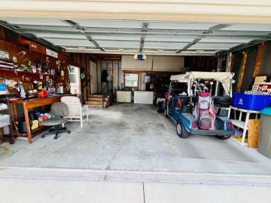 This spacious three-bedroom, two-bathroom home is located in the on Pine Lakes Country Club in Florida - for sale on GolfHomes.com, golf home, golf lot