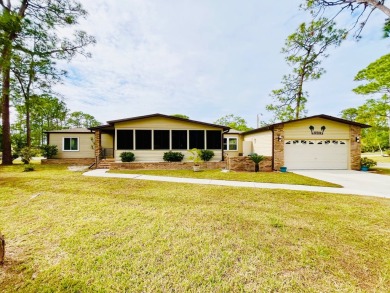 This spacious three-bedroom, two-bathroom home is located in the on Pine Lakes Country Club in Florida - for sale on GolfHomes.com, golf home, golf lot