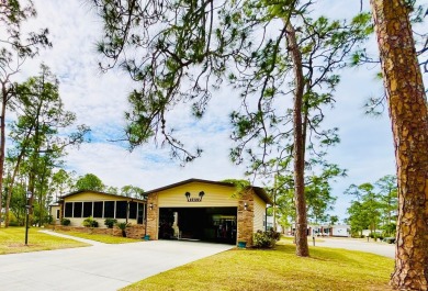 This spacious three-bedroom, two-bathroom home is located in the on Pine Lakes Country Club in Florida - for sale on GolfHomes.com, golf home, golf lot