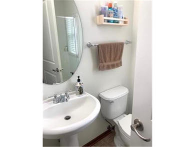 Multi-level walkout townhome with mature pine tree privacy on Deer Run Golf Club in Minnesota - for sale on GolfHomes.com, golf home, golf lot