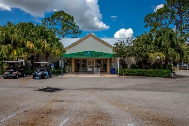 This spacious three-bedroom, two-bathroom home is located in the on Pine Lakes Country Club in Florida - for sale on GolfHomes.com, golf home, golf lot