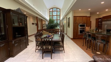 This executive home features 6750 sq. ft. Conveniently located on Marquette Golf Club in Michigan - for sale on GolfHomes.com, golf home, golf lot