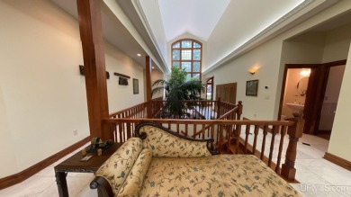 This executive home features 6750 sq. ft. Conveniently located on Marquette Golf Club in Michigan - for sale on GolfHomes.com, golf home, golf lot