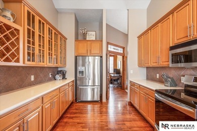 Open Thursday 4:00-5:30. Enter to this beautifully maintained on Pine Lake Golf and Tennis Club in Nebraska - for sale on GolfHomes.com, golf home, golf lot