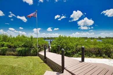 Nestled in a serene enclave, this exceptional property on Coral Creek Club in Florida - for sale on GolfHomes.com, golf home, golf lot