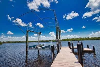 Nestled in a serene enclave, this exceptional property on Coral Creek Club in Florida - for sale on GolfHomes.com, golf home, golf lot