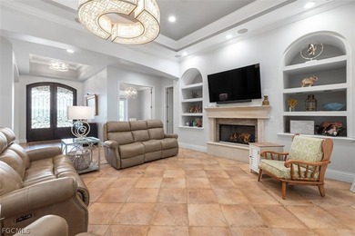 The 3 bedroom 3.5 bathroom home has a beautiful front elevation on Verandah Golf Course and Club in Florida - for sale on GolfHomes.com, golf home, golf lot