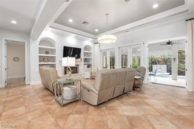 The 3 bedroom 3.5 bathroom home has a beautiful front elevation on Verandah Golf Course and Club in Florida - for sale on GolfHomes.com, golf home, golf lot