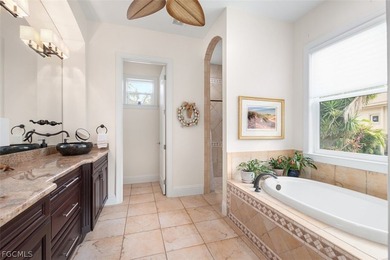 The 3 bedroom 3.5 bathroom home has a beautiful front elevation on Verandah Golf Course and Club in Florida - for sale on GolfHomes.com, golf home, golf lot