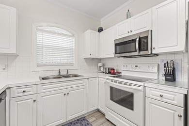 This beautifully maintained, fully furnished three-bedroom on Myrtlewood Golf Course and Club  in South Carolina - for sale on GolfHomes.com, golf home, golf lot