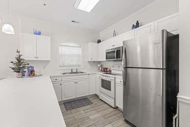 This beautifully maintained, fully furnished three-bedroom on Myrtlewood Golf Course and Club  in South Carolina - for sale on GolfHomes.com, golf home, golf lot