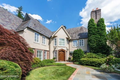 This stunning 5-bedroom, 5.5-bathroom English Tudor waterfront on Navesink Country Club in New Jersey - for sale on GolfHomes.com, golf home, golf lot