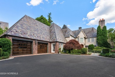 This stunning 5-bedroom, 5.5-bathroom English Tudor waterfront on Navesink Country Club in New Jersey - for sale on GolfHomes.com, golf home, golf lot