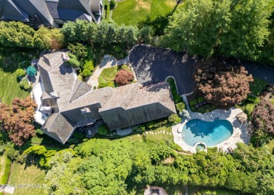 This stunning 5-bedroom, 5.5-bathroom English Tudor waterfront on Navesink Country Club in New Jersey - for sale on GolfHomes.com, golf home, golf lot