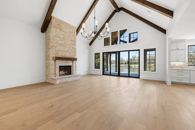 COMPLETELY RENOVATED. REIMAGINED. PRACTICALLY REBUILT FROM THE on Great Waters Course At Reynolds Plantation in Georgia - for sale on GolfHomes.com, golf home, golf lot