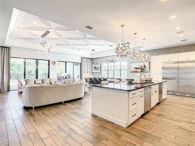 Welcome to 550 Muirfield Loop - The Epitome of Luxury in Reunion on ChampionsGate Golf Resort in Florida - for sale on GolfHomes.com, golf home, golf lot