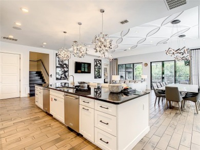 Welcome to 550 Muirfield Loop - The Epitome of Luxury in Reunion on ChampionsGate Golf Resort in Florida - for sale on GolfHomes.com, golf home, golf lot