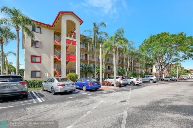 This immaculate corner unit in a newer building of a great 55+ on Flamingo Lakes Country Club in Florida - for sale on GolfHomes.com, golf home, golf lot