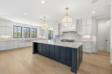 COMPLETELY RENOVATED. REIMAGINED. PRACTICALLY REBUILT FROM THE on Great Waters Course At Reynolds Plantation in Georgia - for sale on GolfHomes.com, golf home, golf lot