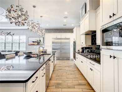 Welcome to 550 Muirfield Loop - The Epitome of Luxury in Reunion on ChampionsGate Golf Resort in Florida - for sale on GolfHomes.com, golf home, golf lot