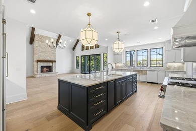 COMPLETELY RENOVATED. REIMAGINED. PRACTICALLY REBUILT FROM THE on Great Waters Course At Reynolds Plantation in Georgia - for sale on GolfHomes.com, golf home, golf lot