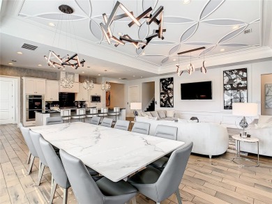 Welcome to 550 Muirfield Loop - The Epitome of Luxury in Reunion on ChampionsGate Golf Resort in Florida - for sale on GolfHomes.com, golf home, golf lot