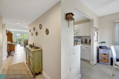 This immaculate corner unit in a newer building of a great 55+ on Flamingo Lakes Country Club in Florida - for sale on GolfHomes.com, golf home, golf lot