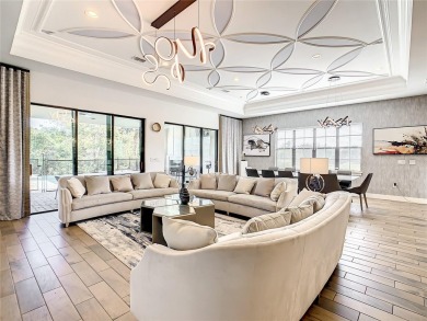 Welcome to 550 Muirfield Loop - The Epitome of Luxury in Reunion on ChampionsGate Golf Resort in Florida - for sale on GolfHomes.com, golf home, golf lot