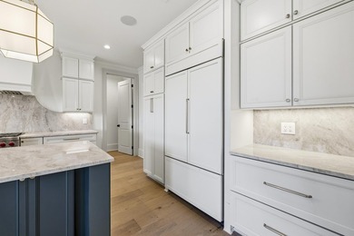 COMPLETELY RENOVATED. REIMAGINED. PRACTICALLY REBUILT FROM THE on Great Waters Course At Reynolds Plantation in Georgia - for sale on GolfHomes.com, golf home, golf lot