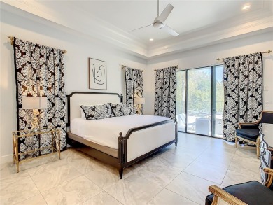 Welcome to 550 Muirfield Loop - The Epitome of Luxury in Reunion on ChampionsGate Golf Resort in Florida - for sale on GolfHomes.com, golf home, golf lot