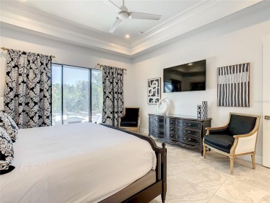 Welcome to 550 Muirfield Loop - The Epitome of Luxury in Reunion on ChampionsGate Golf Resort in Florida - for sale on GolfHomes.com, golf home, golf lot