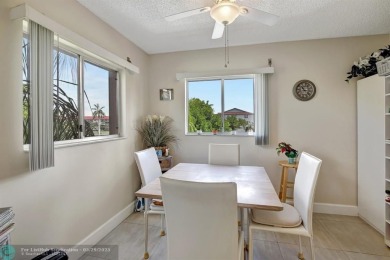 This immaculate corner unit in a newer building of a great 55+ on Flamingo Lakes Country Club in Florida - for sale on GolfHomes.com, golf home, golf lot