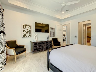Welcome to 550 Muirfield Loop - The Epitome of Luxury in Reunion on ChampionsGate Golf Resort in Florida - for sale on GolfHomes.com, golf home, golf lot