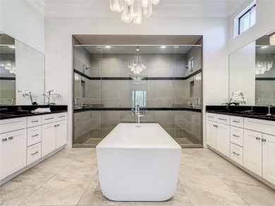 Welcome to 550 Muirfield Loop - The Epitome of Luxury in Reunion on ChampionsGate Golf Resort in Florida - for sale on GolfHomes.com, golf home, golf lot