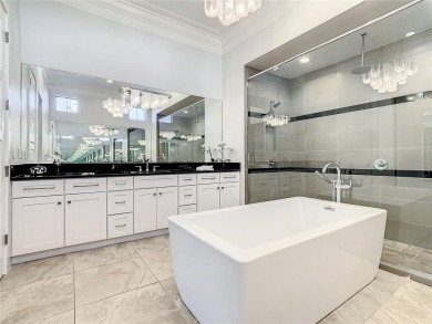 Welcome to 550 Muirfield Loop - The Epitome of Luxury in Reunion on ChampionsGate Golf Resort in Florida - for sale on GolfHomes.com, golf home, golf lot