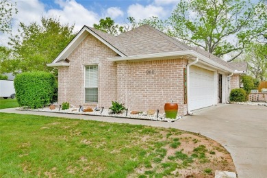 Nestled by the serene orchard of Pecan Plantation, this on Pecan Plantation Country Club in Texas - for sale on GolfHomes.com, golf home, golf lot