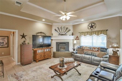 Nestled by the serene orchard of Pecan Plantation, this on Pecan Plantation Country Club in Texas - for sale on GolfHomes.com, golf home, golf lot