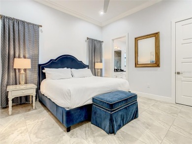 Welcome to 550 Muirfield Loop - The Epitome of Luxury in Reunion on ChampionsGate Golf Resort in Florida - for sale on GolfHomes.com, golf home, golf lot