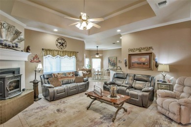 Nestled by the serene orchard of Pecan Plantation, this on Pecan Plantation Country Club in Texas - for sale on GolfHomes.com, golf home, golf lot