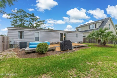 Adorable place at the beach in one of the areas favorite on Brick Landing Plantation Yacht and Golf Club in North Carolina - for sale on GolfHomes.com, golf home, golf lot