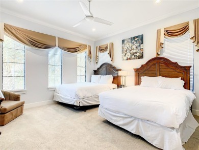 Welcome to 550 Muirfield Loop - The Epitome of Luxury in Reunion on ChampionsGate Golf Resort in Florida - for sale on GolfHomes.com, golf home, golf lot