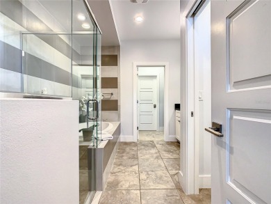 Welcome to 550 Muirfield Loop - The Epitome of Luxury in Reunion on ChampionsGate Golf Resort in Florida - for sale on GolfHomes.com, golf home, golf lot