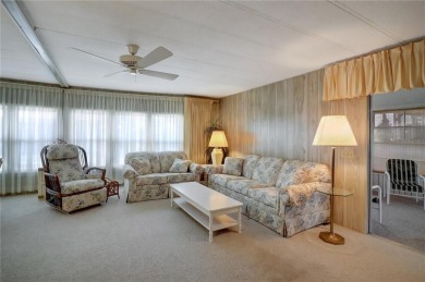 Lots of space in this 2 bedroom/2 full bath 1979 manufactured on Maple Leaf Golf and Country Club in Florida - for sale on GolfHomes.com, golf home, golf lot