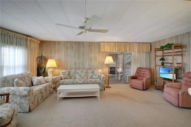 Lots of space in this 2 bedroom/2 full bath 1979 manufactured on Maple Leaf Golf and Country Club in Florida - for sale on GolfHomes.com, golf home, golf lot