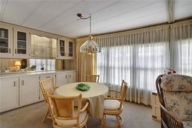 Lots of space in this 2 bedroom/2 full bath 1979 manufactured on Maple Leaf Golf and Country Club in Florida - for sale on GolfHomes.com, golf home, golf lot