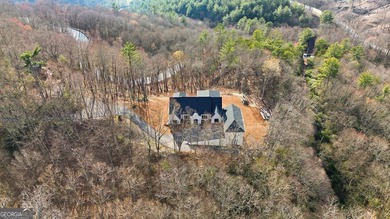 Luxurious Spanish/Mediterranean Custom Estate perched on 5.19 on Sky Valley Resort and Country Club in Georgia - for sale on GolfHomes.com, golf home, golf lot