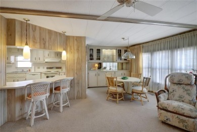 Lots of space in this 2 bedroom/2 full bath 1979 manufactured on Maple Leaf Golf and Country Club in Florida - for sale on GolfHomes.com, golf home, golf lot